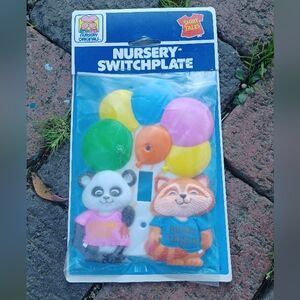 Vintage 80s unopened colorful Shirt Tales Gerber wall nursery light switch plate